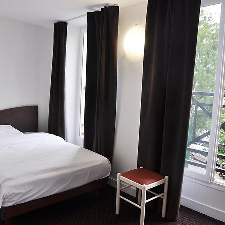 Hotel De La Tour Париж Стая снимка